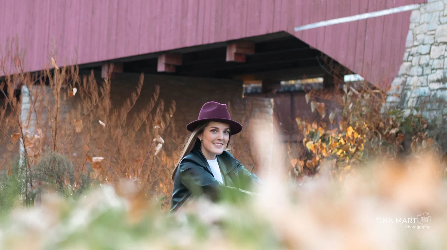 An autumn portrait by the covered bridge